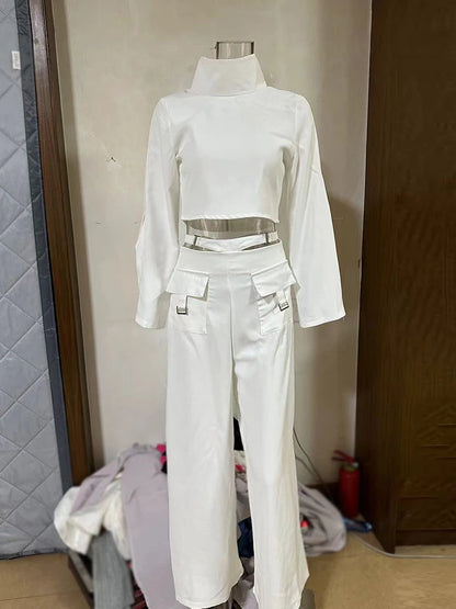 Elegantes zweiteiliges Damen-Set mit V-Ausschnitt, ärmellosem Oberteil und hoch tailliertem Rock mit 3D-Blumendetails.