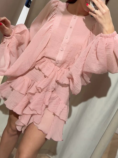 Asymmetrisches ärmelloses Damenkleid mit Rundhalsausschnitt und Stickerei – figurbetont und hohldesignt.