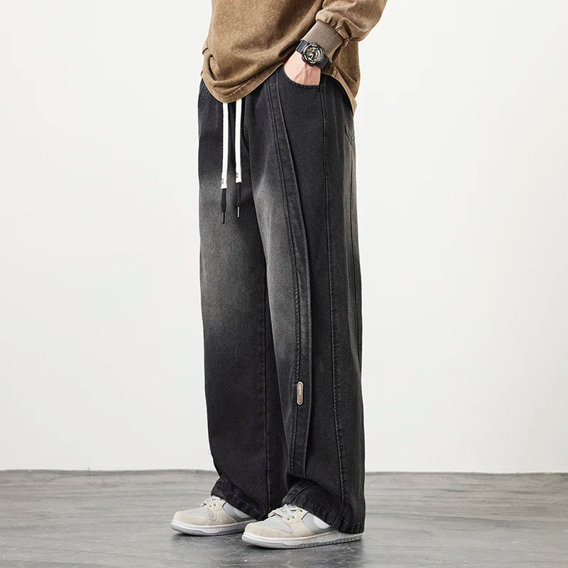 Herren Jeanshose mit brauner Stickerei im Hip Hop Stil