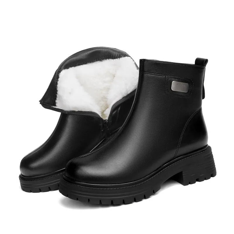 Schwarze Damen-Snowboots aus Leder mit Wollfutter, robuste Profilsohle