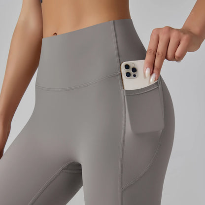 Graue High-Waist-Leggings mit seitlicher Oberschnitttasche, Detailansicht