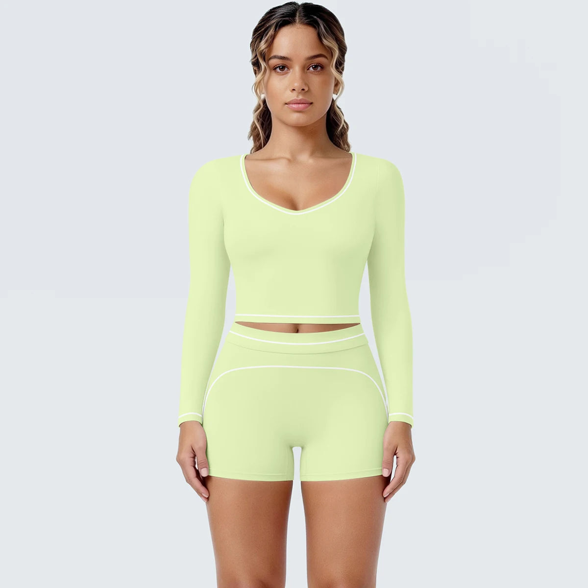 Yoga-Set Hellgrün mit langarmigem Crop-Top und Shorts, Kontrastlinien