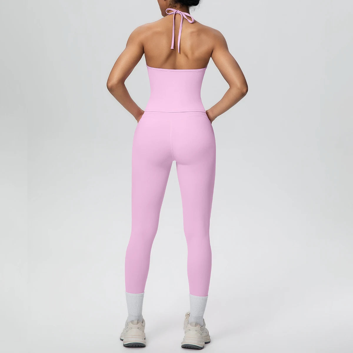 Rosa Damen-Yogaset: Tanktop mit Rückenträgern und Capri-Leggings