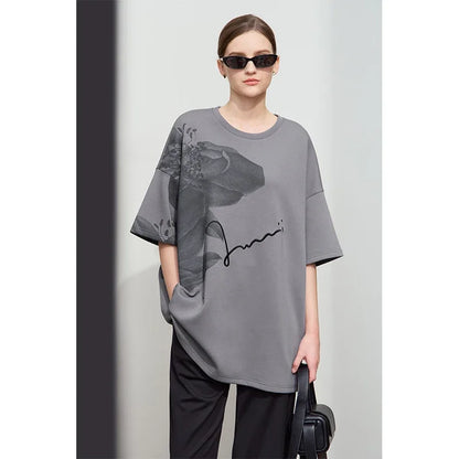 Damen T-Shirt mit lockerem O-Ausschnitt und Blumenmuster sowie Stickerei