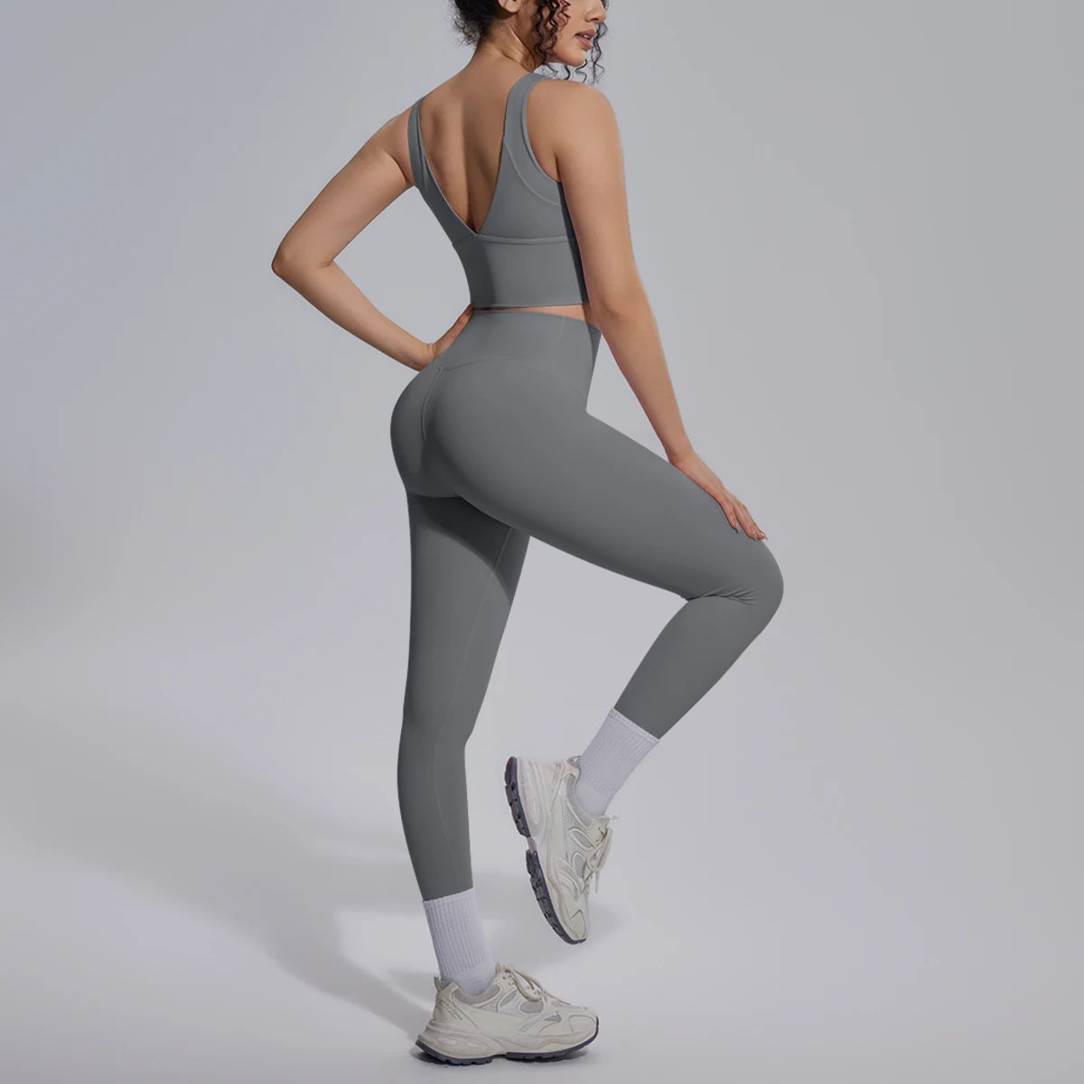 Damen-Yoga-Set, grau: Top mit V-Rücken und Leggings mit Knie-Bund