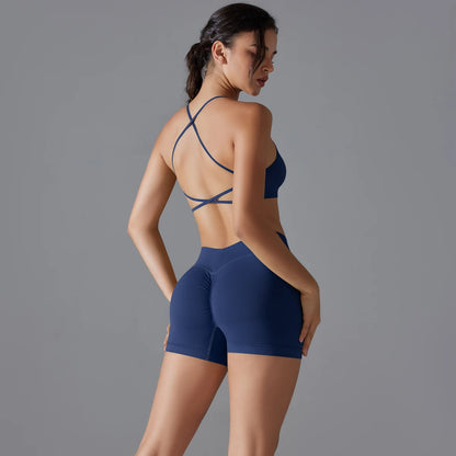 Hamidou nahtloses Yoga-Set in Navy: Rückansicht von Sport-BH und Shorts