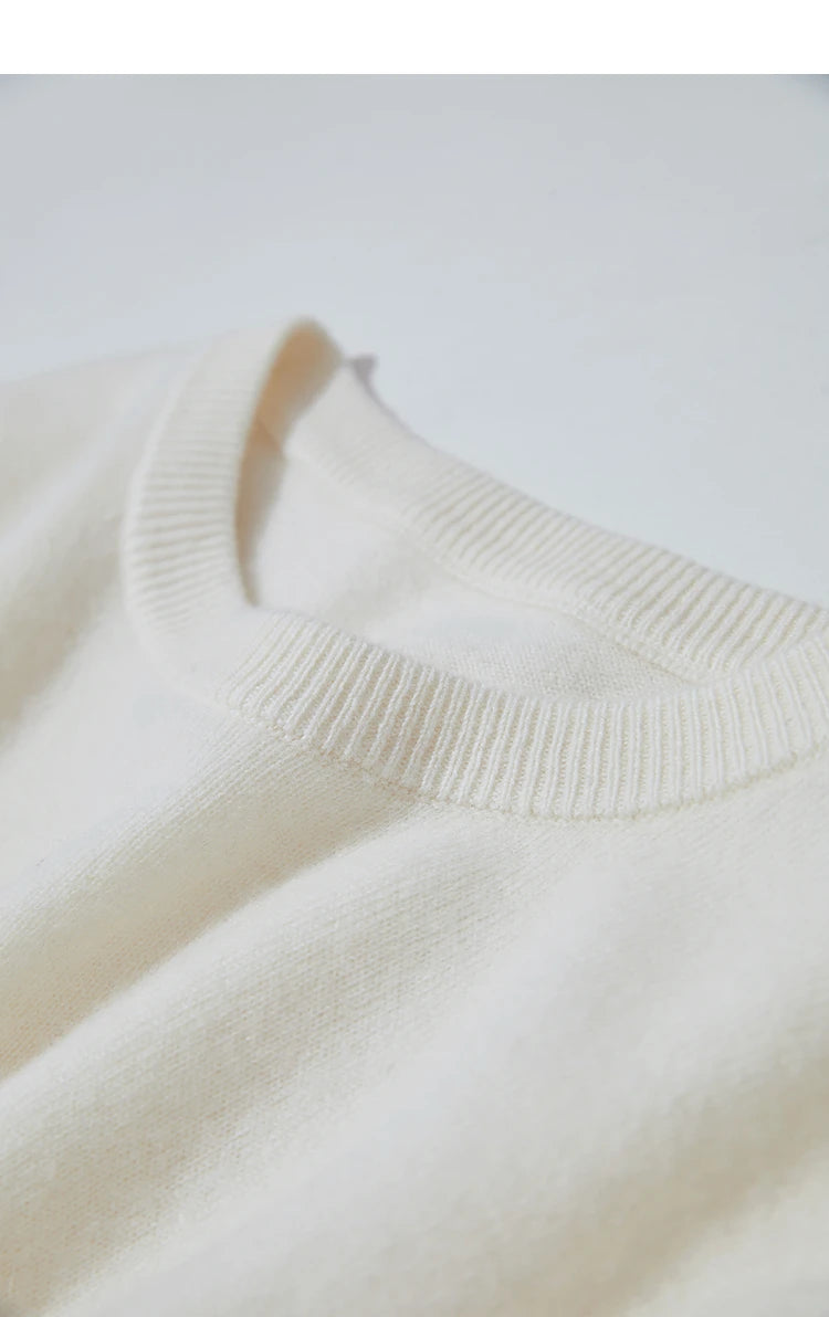 Cremefarbener Damenpullover mit Rundhalsausschnitt und geripptem Strickbündchen, langarm
