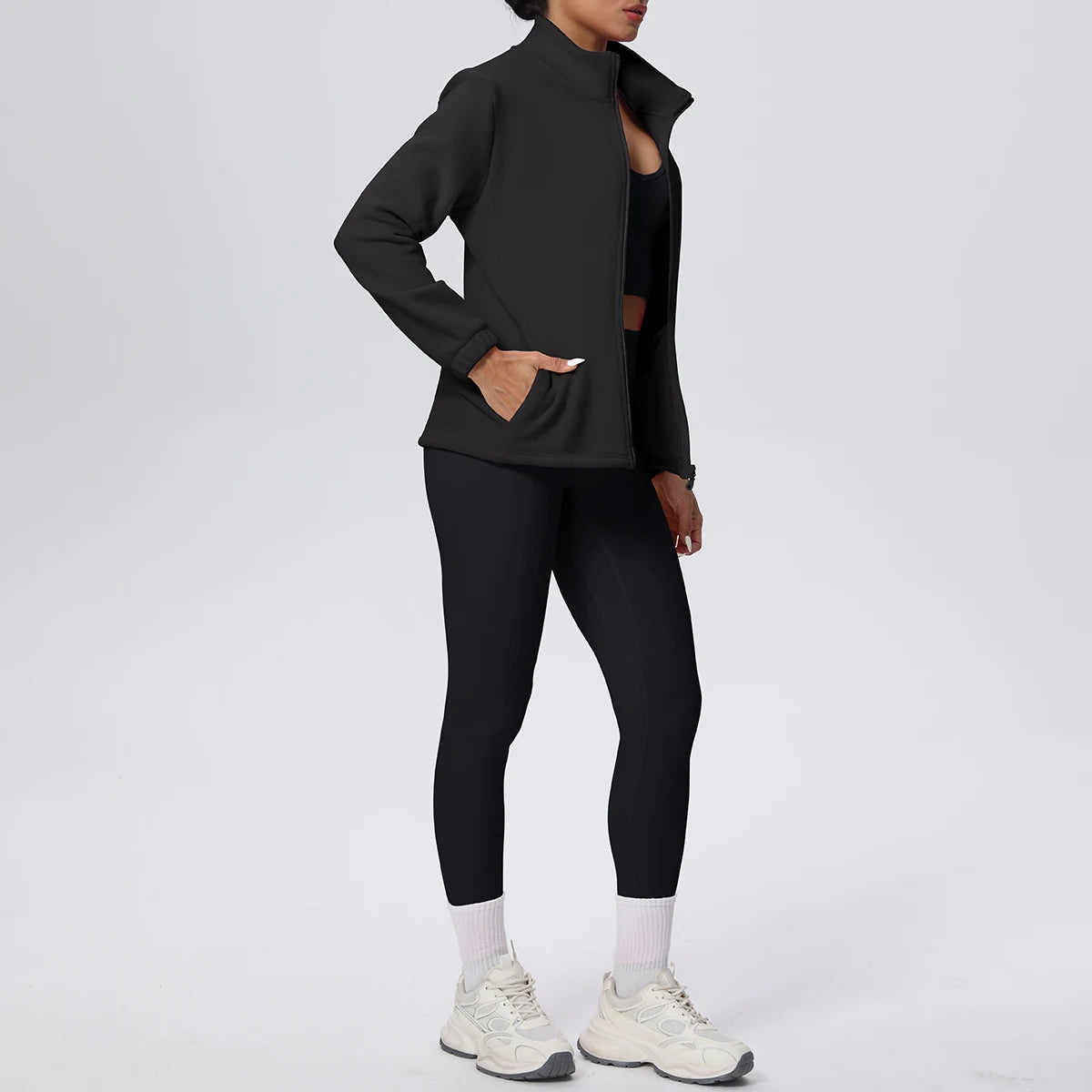 Damen Yoga-Set in schwarz: Zip-Jacke und Leggings mit weißen Bündchen am Beinabschluss