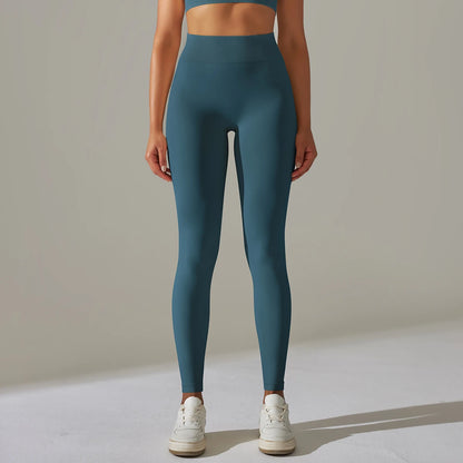 Nahtlose Yoga-Leggings mit hoher Taille, petrolblau, Frontansicht, lange Beine
