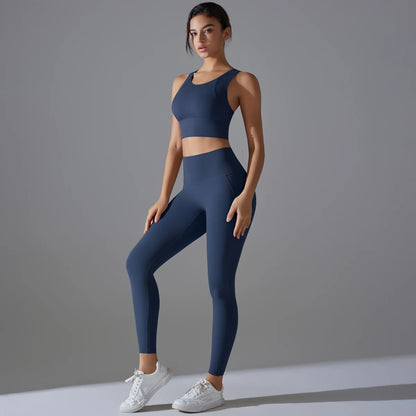 Damen-Yoga-Set in Dunkelblau: ärmelloses Crop-Top und lange Laufhose, figurbetont