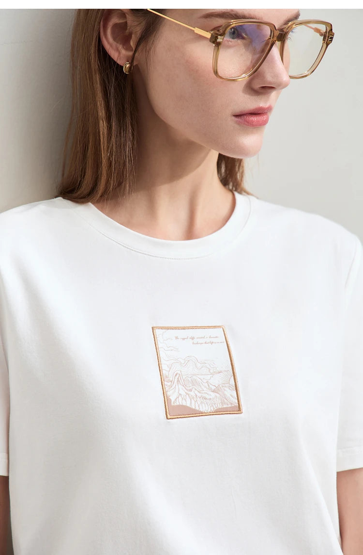 Damen T-Shirt aus Baumwolle mit lässigem O-Ausschnitt und modischer Stickerei