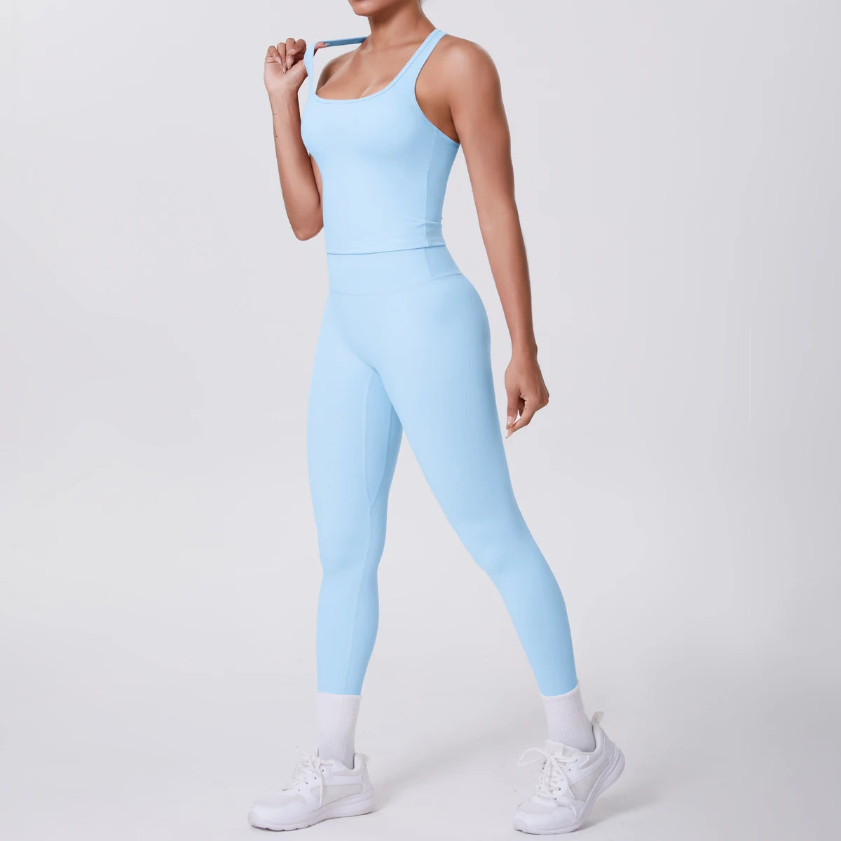 Damen Yoga-Set mit Trägertop und Leggings, einfarbig hellblau, Frontansicht