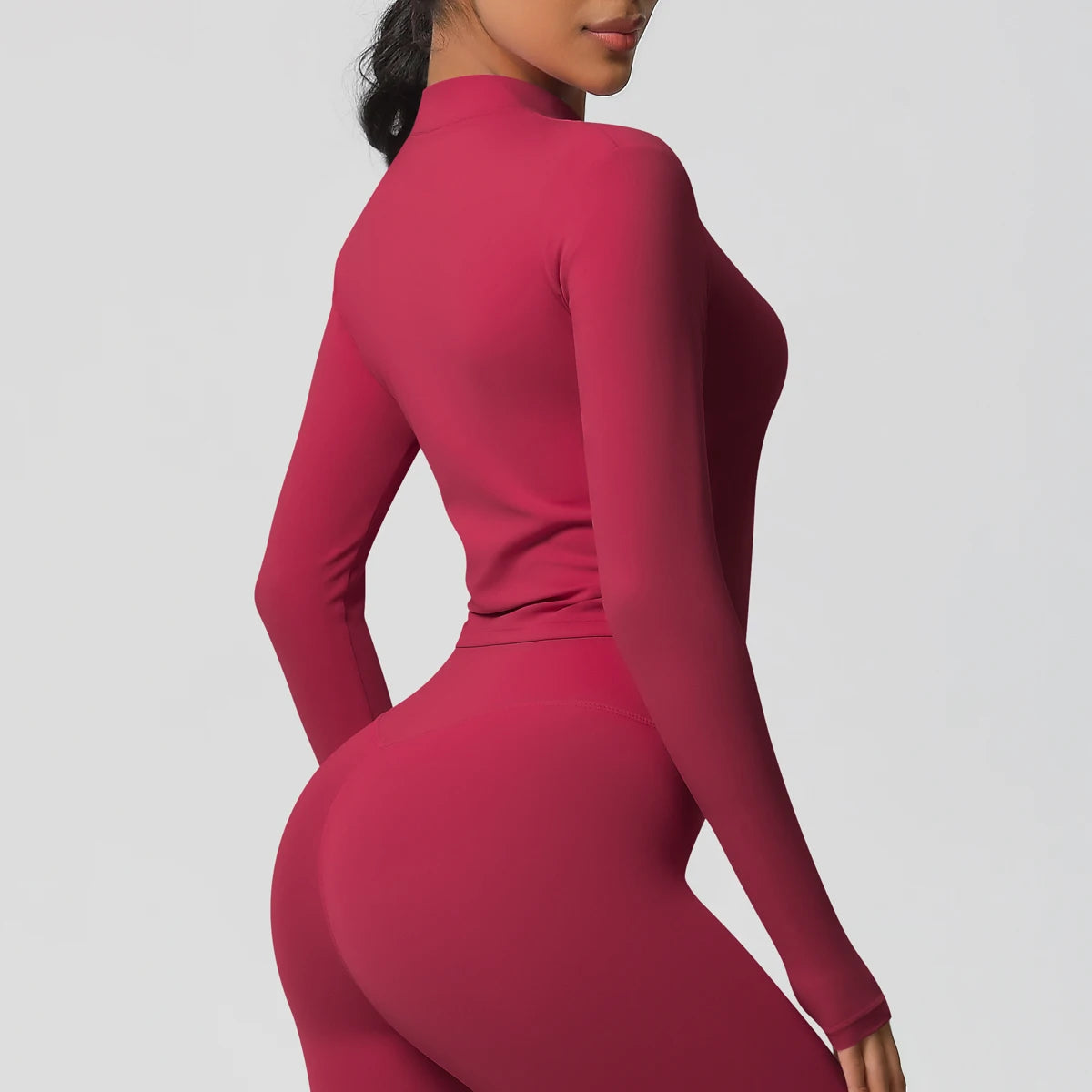 Langarm-Fitnessoberteil, Slim Fit, magenta, Rückenansicht, Stehkragen mit Reißverschluss