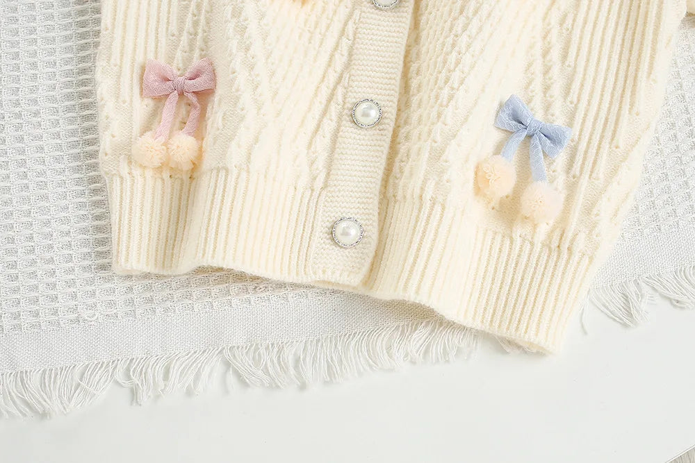 Mädchen Strickjacke in Candy-Farbe mit Bogen für den Herbst