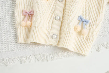 Mädchen Strickjacke in Candy-Farbe mit Bogen für den Herbst