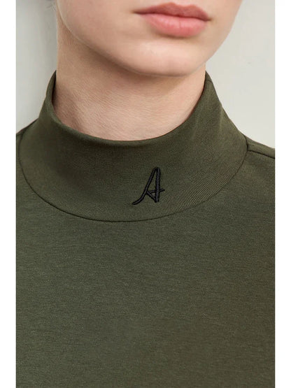 Damen T-Shirts im Minimalismus-Stil mit Mock-Neck und Stickerei aus Baumwolle