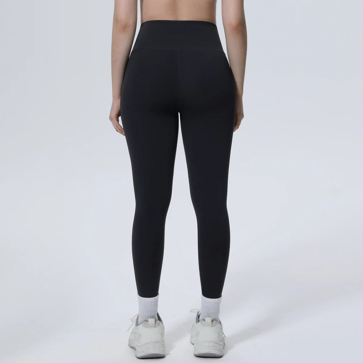 Nahtlose schwarze Yoga-Leggings für Damen, hohe Taille mit überkreuztem Bund
