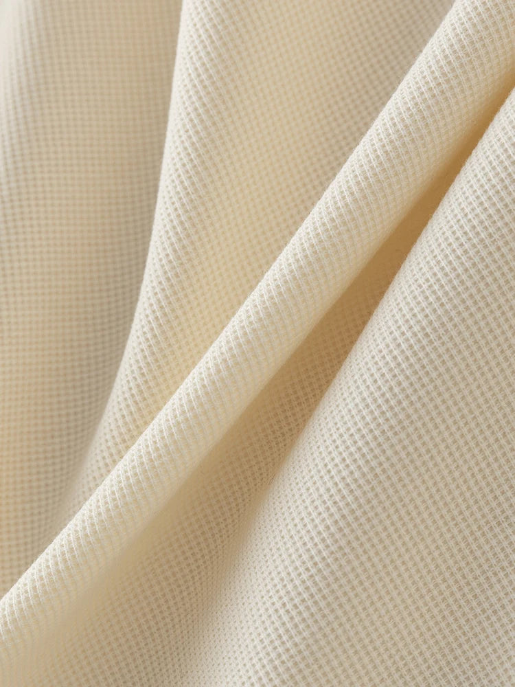 Französischer Damen-Zweiteiler mit lockerem Oberteil und weit geschnittener Hose – Sommerliches Design mit hoch taillierter Hose
