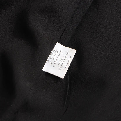 Elegantes Damenkleid mit Rundhalsausschnitt, langen Ärmeln und Patchwork-Design in lockerer Passform.