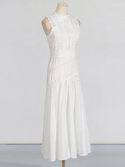 Ärmelloses Damen-Spitzenkleid mit Rundhalsausschnitt und Patchwork-Design – figurbetont und mit Hohldetails.
