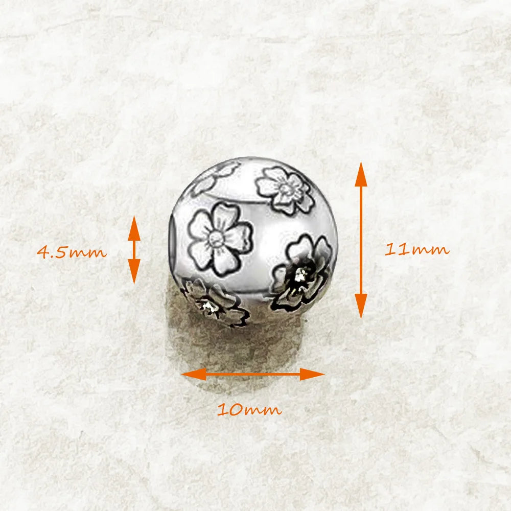 Charm-Perle mit Blütenmotiv, Maße ca. 10x11x4,5 mm