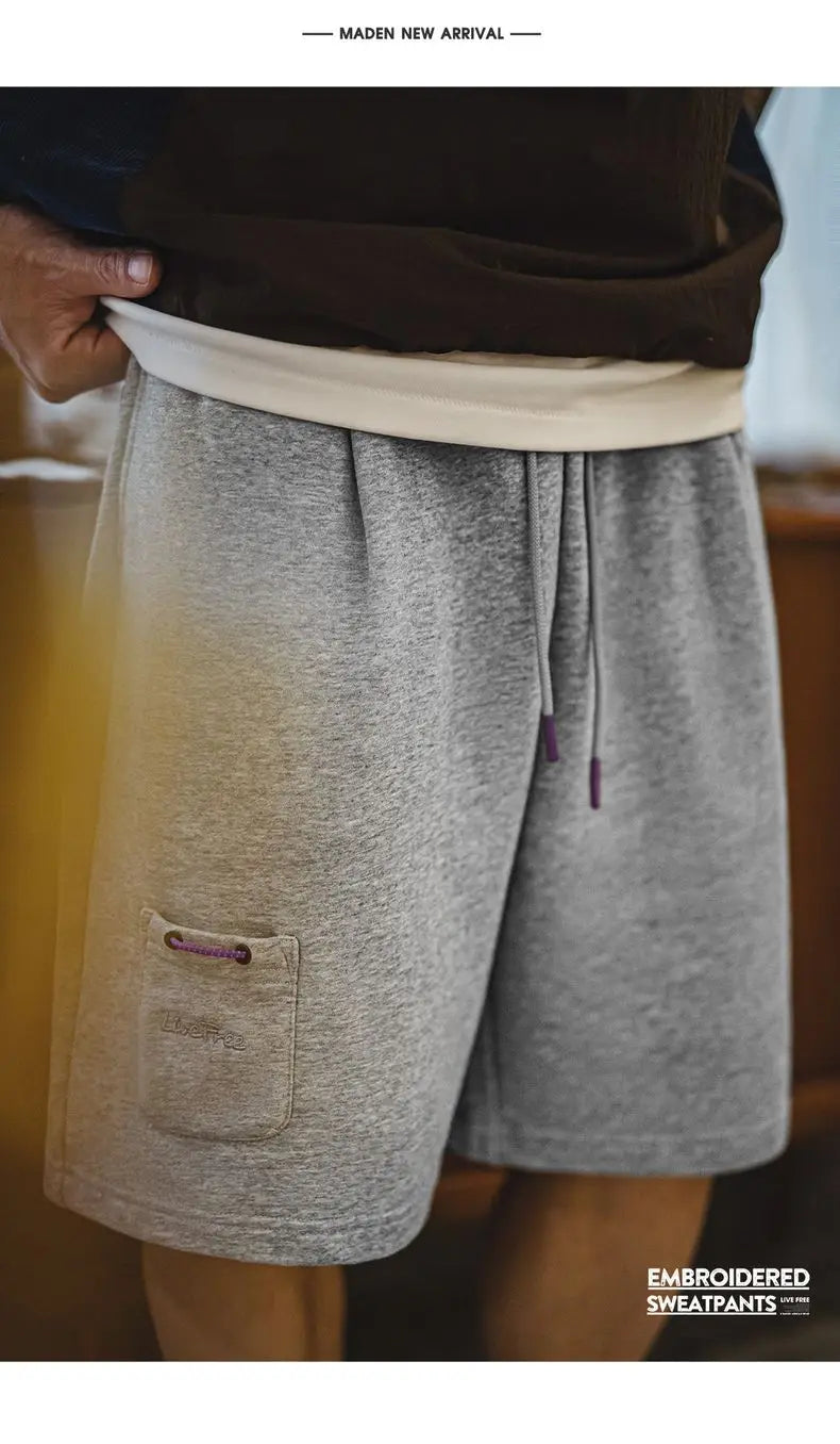 Herren Jogger-Shorts aus atmungsaktivem Material mit elastischer Taille und lockerer Passform