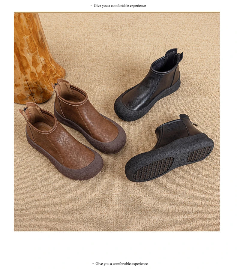 Paar Damen-Stiefeletten aus Leder: braun und schwarz, flach, runder Zehenbereich, Profil