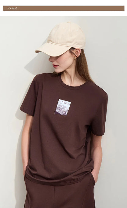 Damen T-Shirt aus Baumwolle mit lässigem O-Ausschnitt und modischer Stickerei