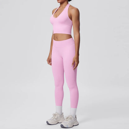 Yoga-Set für Frauen, Sport-BH und lange Leggings, pfirsichrosa, nahtarm, enganliegend.