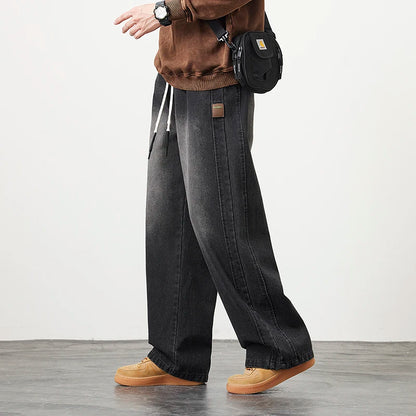 Männer Jeans mit elastischer Taille in schwarz-blauer Farbgebung im Hip Hop Stil