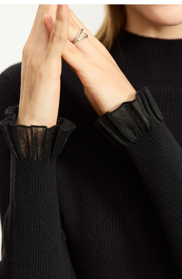 Schwarzer Strickpullover mit Rollkragen und gerippten Manschetten