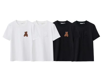 Damen Top im minimalistischen Stil mit Bären-Applikation und O-Ausschnitt