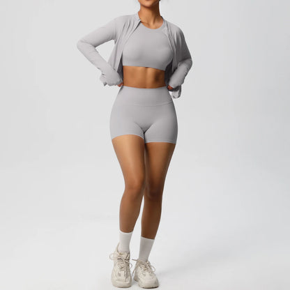Graues Damen Yoga-Set: langärmliges Crop-Top und kurze Radlerhose