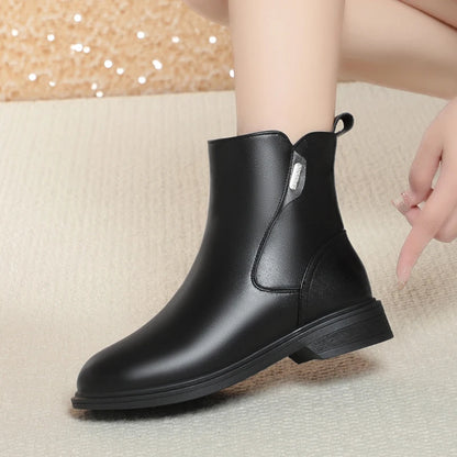 Schwarze Chelsea-Boots mit runder Kappe, seitlicher Naht und Blockabsatz