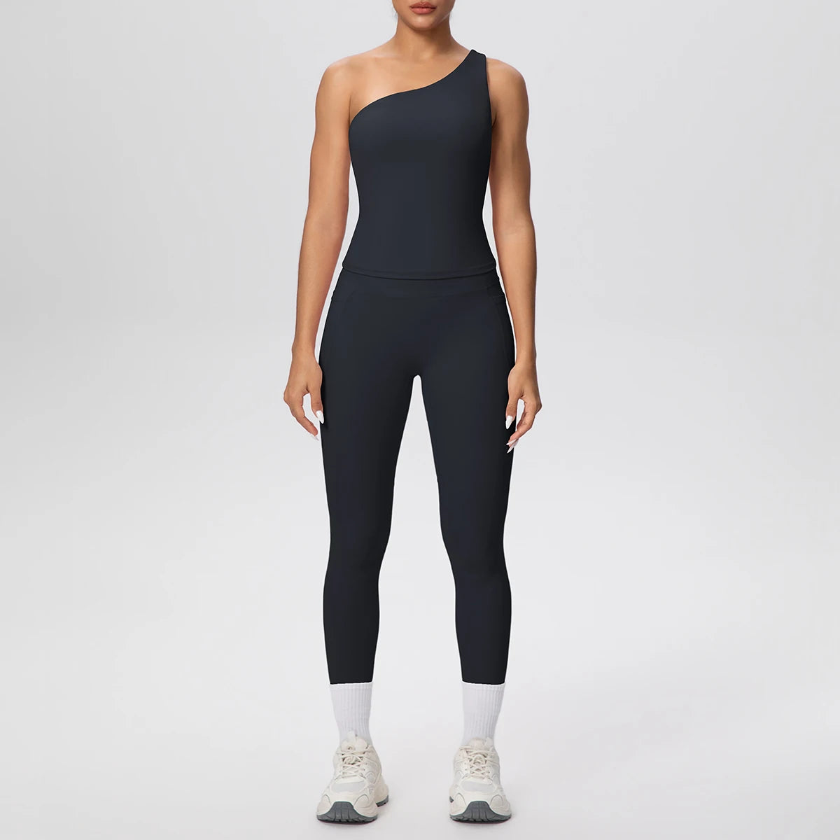 Yoga-Set aus ärmellosem Top und Leggings, schwarz mit hellem Beinabschluss
