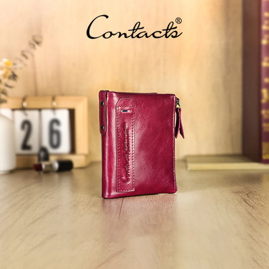 Damen-Geldbörse aus Leder in Fuchsia, mit Reißverschluss und Kartenfächern.